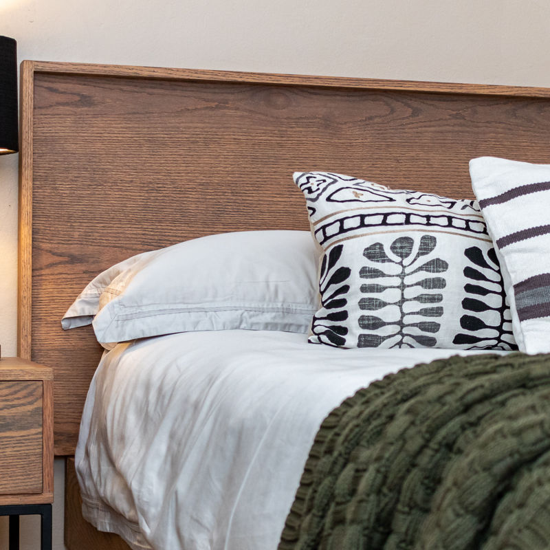 Wooden headboard with bed